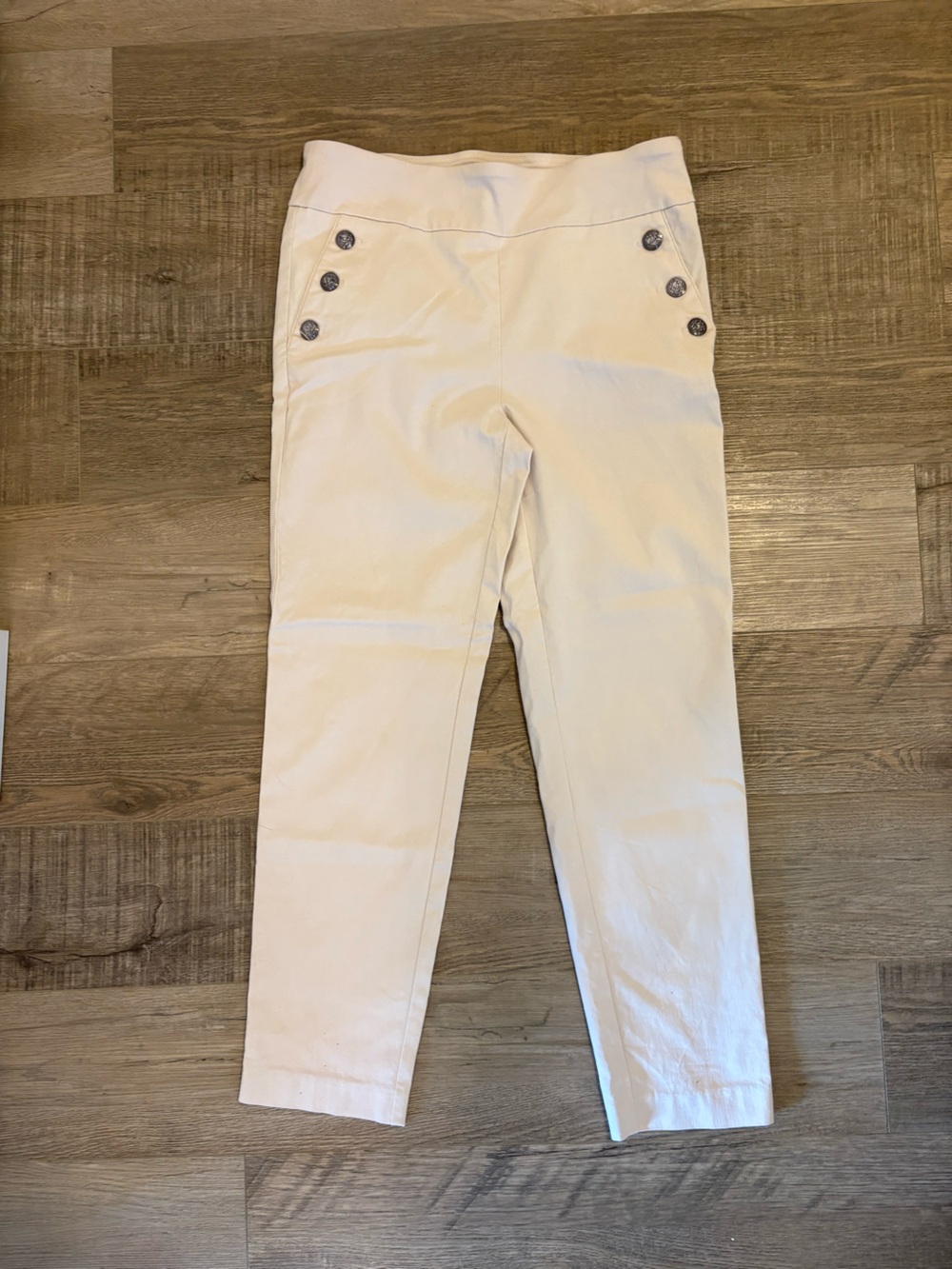 Cream capris with button pockets